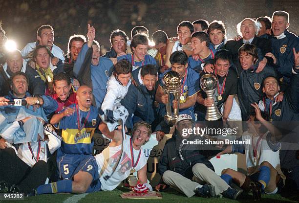 The Boca Juniors team and staff celebrate victory over Real Madrid after the Toyota Intercontinental Cup in the National Stadiu,Tokyo,Japan.Boca...