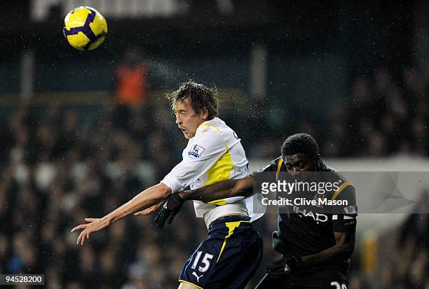 Peter Crouch of Spurs wins a header under pressure from Kolo Toure of Manchester City during the Barclays Premier League match between Tottenham...