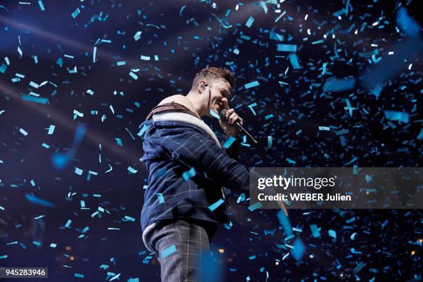 The alternative rock group american Imagine Dragons with the singer Dan Reynolds is photographed for Paris Match on stage on March 03, 2018 in...