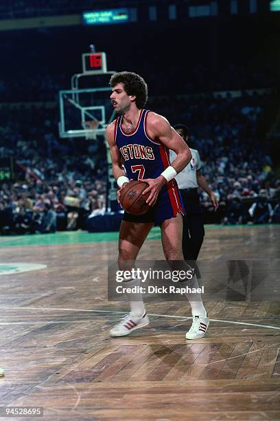 Kelly Tripucka of the Detroit Pistons looks to make a move against the Boston Celtics during a game played in 1982 at the Boston Garden in Boston,...