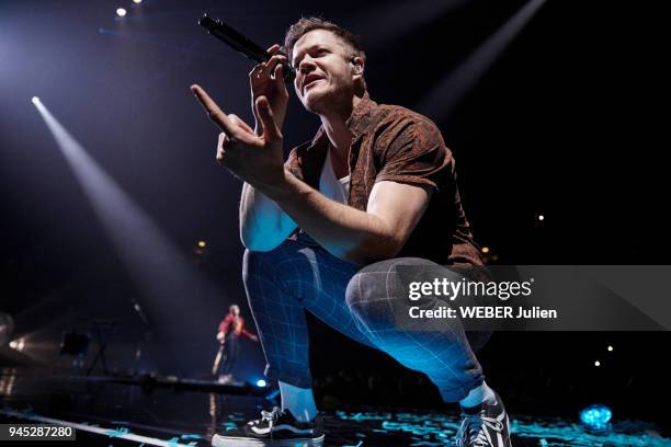 The alternative rock group american Imagine Dragons with the singer Dan Reynolds is photographed for Paris Match on stage on March 03, 2018 in...