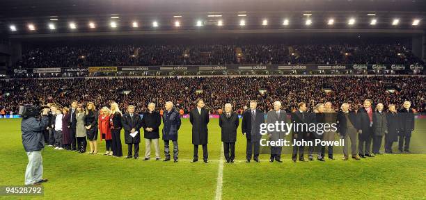 Liverpool legendary players walk onto the pitch as bag-pipes play at Anfield in commemoration of Bill Shankly's 50th anniversary of being involved at...