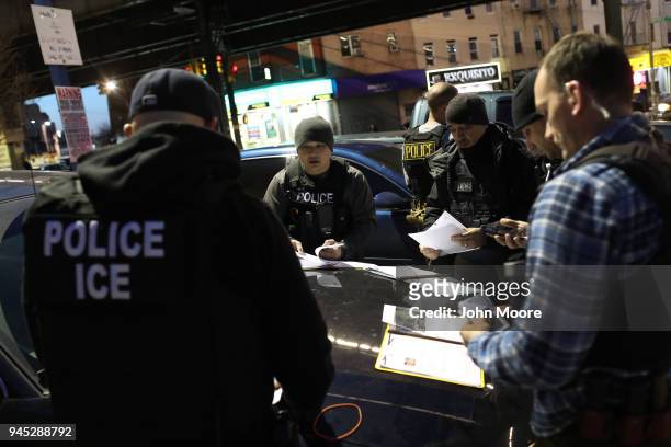 Immigration and Customs Enforcement , officers prepare for morning operations to arrest undocumented immigrants on April 11, 2018 in New York City....