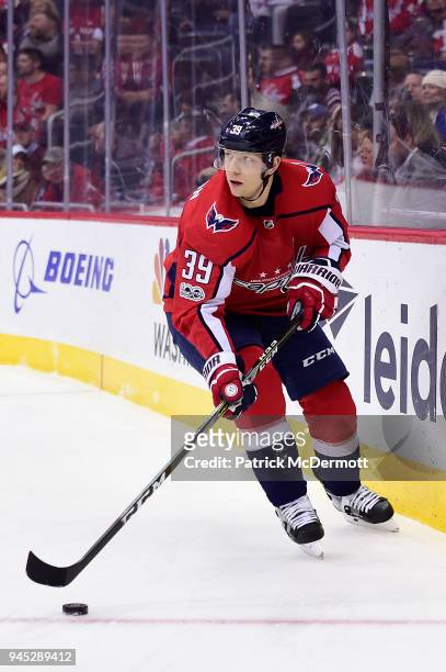 Alex Chiasson of the Washington Capitals skates with the puck in the first period against the Los Angeles Kings at Capital One Arena on November 30,...