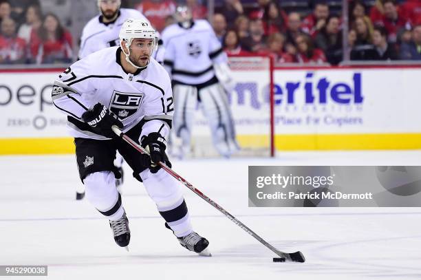 Alec Martinez of the Los Angeles Kings skates with the puck against the Washington Capitals in the second period at Capital One Arena on November 30,...