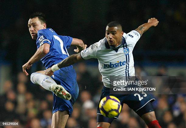 Chelsea's Captain John Terry vies with Kevin-Prince Boateng of Portsmouth during a Premier League match at Stamford Bridge in London, England on...