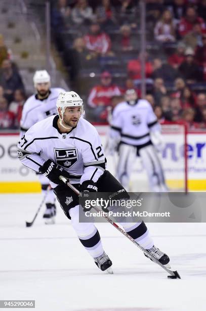 Alec Martinez of the Los Angeles Kings skates with the puck against the Washington Capitals in the second period at Capital One Arena on November 30,...