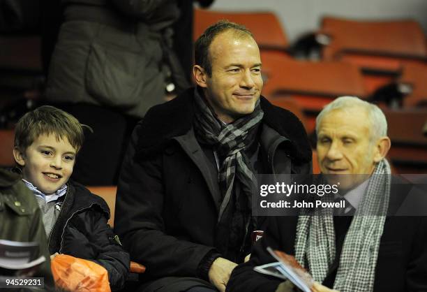 Alan Shearer and Peter Reid both watch the Liverpool match in the stands during the Barclays Premier League match between Liverpool and Wigan...