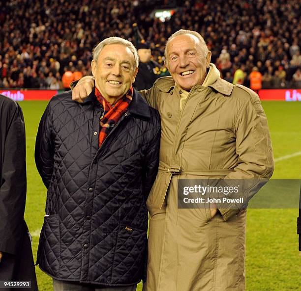 Liverpool legendary players including Ian St John walk onto the pitch as bag-pipes play at Anfield in commemoration of Bill Shankly's 50th...