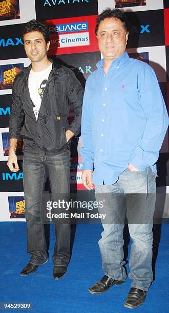 Director Harry Baweja with his son Harman at the Indian premiere of the film 'Avatar' in Mumbai on Tuesday, December 15, 2009.