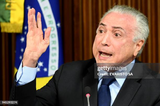 Brazilian President Michel Temer delivers a speech during a ministerial cabinet meeting at Planalto Palace in Brasilia on April 12, 2018. Temer...