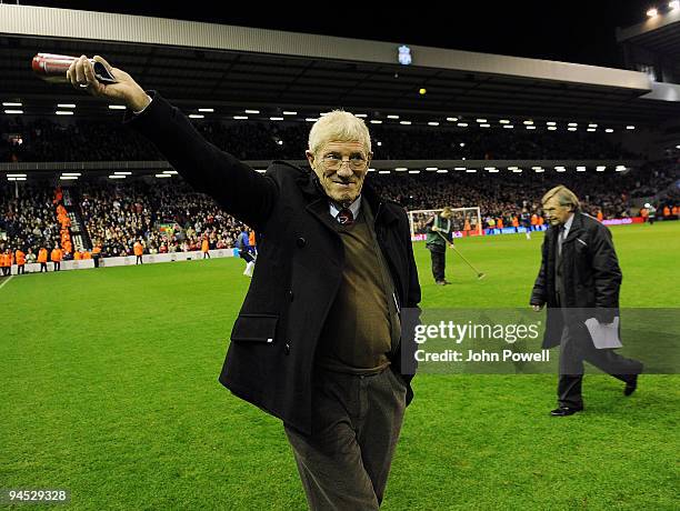 Liverpool legendary players walk onto the pitch as bag-pipes play at Anfield in commemoration of Bill Shankly's 50th anniversary of being involved at...