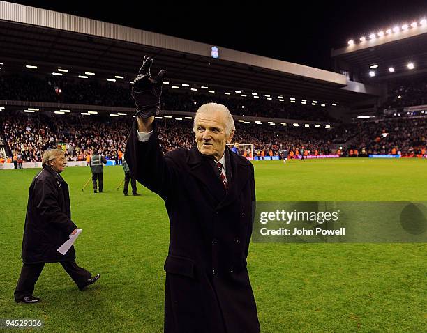 Liverpool legendary players walk onto the pitch as bag-pipes play at Anfield in commemoration of Bill Shankly's 50th anniversary of being involved at...