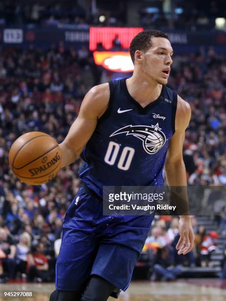 Aaron Gordon of the Orlando Magic dribbles the ball during the first half of an NBA game against the Toronto Raptors at Air Canada Centre on April 8,...