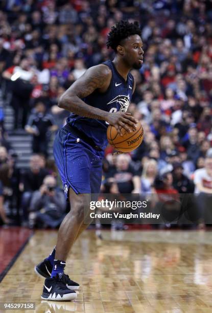 Jamel Artis of the Orlando Magic dribbles the ball during the first half of an NBA game against the Toronto Raptors at Air Canada Centre on April 8,...