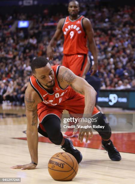 Norman Powell of the Toronto Raptors dribbles the ball during the second half of an NBA game against the Orlando Magic at Air Canada Centre on April...