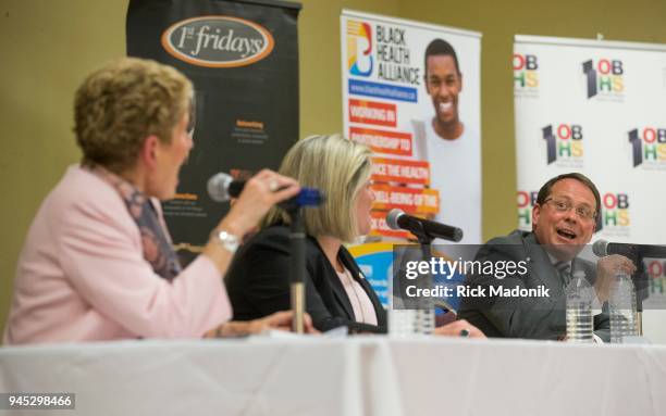 Three of the four party leaders in Ontario attend a debate at the Canadian Jamaican Association Centre. From left, Liberal Kathleen Wynne, Green...