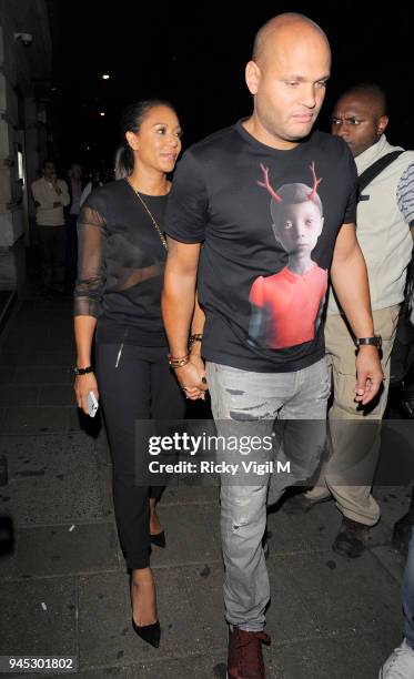 Mel B and Stephen Belafonte arrive at Novikov restaurant on August 8, 2014 in London, England.