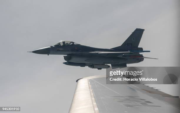 Dutch Air Force F-16 fighter flies near a Dutch Air Force KDC10 tanker after having been refueled over the North Sea during press day of European Air...