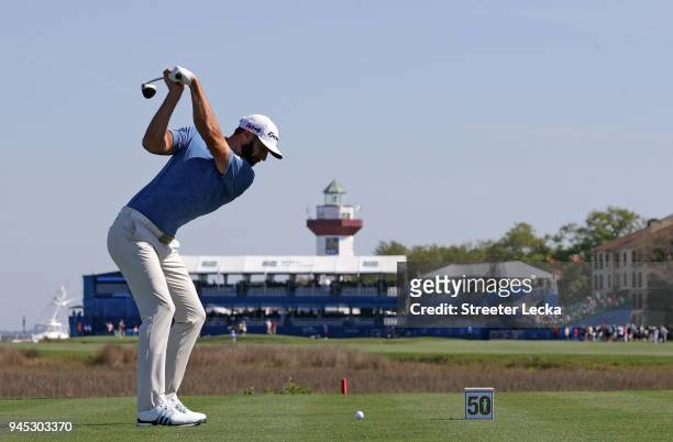 Dustin Johnson plays his tee shot on the 18th hole during the first round of the 2018 RBC Heritage at Harbour Town Golf Links on April 12, 2018 in...