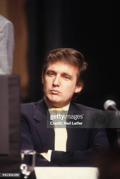 Heavyweight Title Preview: Closeup of celebrity businessman Donald Trump on podium during media press conference before Mike Tyson vs Michael Spinks...