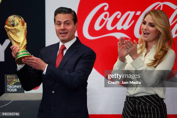 Enrique Pena Nieto, President of Mexico and his wife Angelica Rivera de Pena attend during the FIFA Trophy Tour at Residencia Oficial de Los Pinos on...