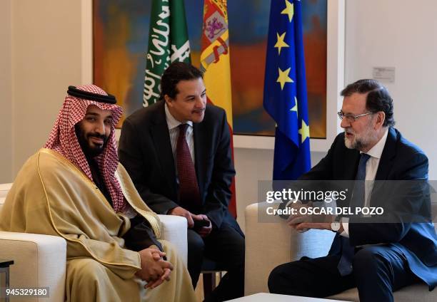 Saudi Arabia's crown prince Mohammed bin Salman meets with Spanish prime minister Mariano Rajoy at La Moncloa palace in Madrid on April 12, 2018....