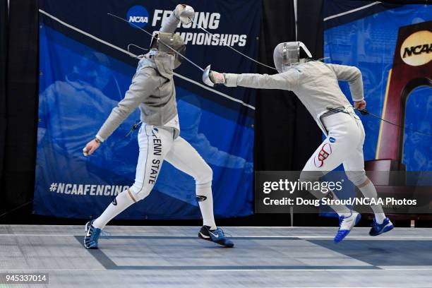 Andrew Mackiewicz of Penn State University takes on Eli Dershwitz of Harvard University during the semifinals of the saber competition during the...