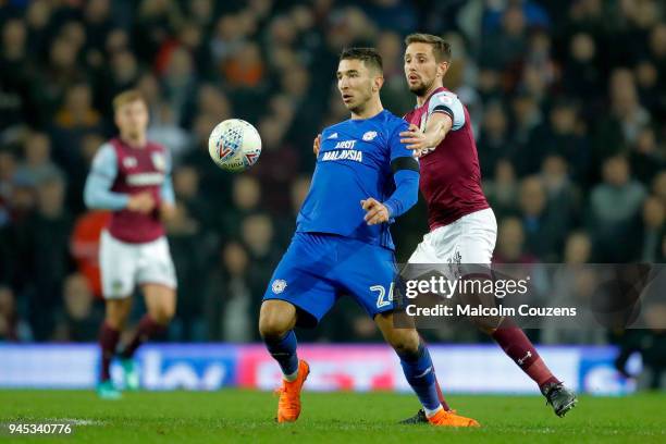 Marko Grujic of Cardiff City competes with Conor Hourihane of Aston Villa during the Sky Bet Championship match between Aston Villa and Cardiff City...