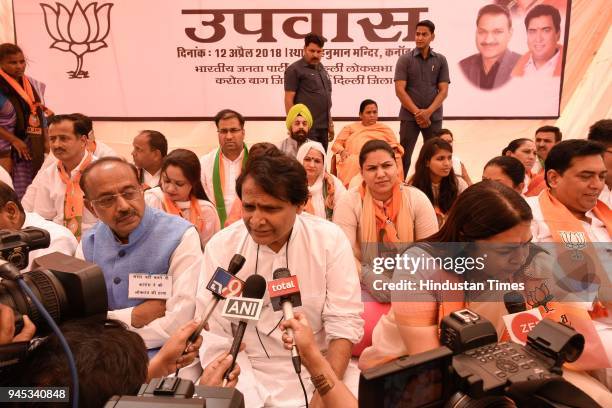 Ministers Meenakshi Lekhi, Suresh Prabhu, Vijay Goel and others during a day-long hunger strike to protest against the disruption of Parliament by...