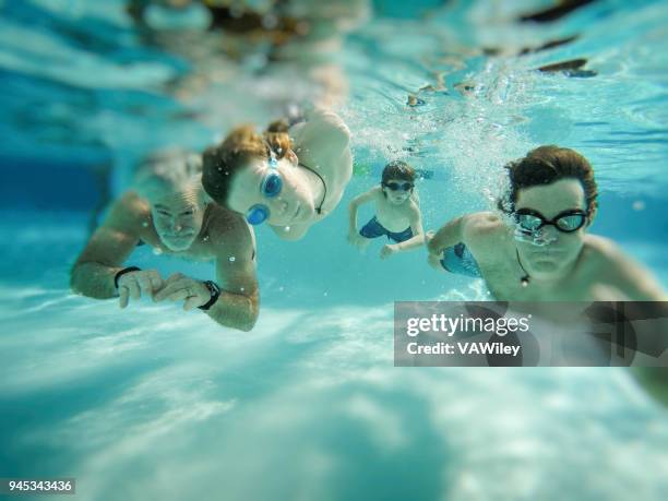 family swim time with grandpa - old people diving stock pictures, royalty-free photos & images