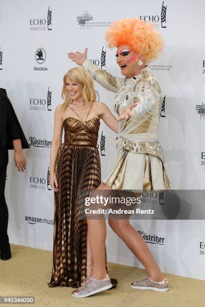 Kylie Minogue and German drag queen Olivia Jones arrive for the Echo Award at Messe Berlin on April 12, 2018 in Berlin, Germany.