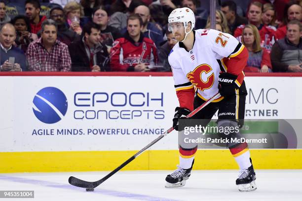 Dougie Hamilton of the Calgary Flames skates with the puck in the first period against the Washington Capitals at Capital One Arena on November 20,...