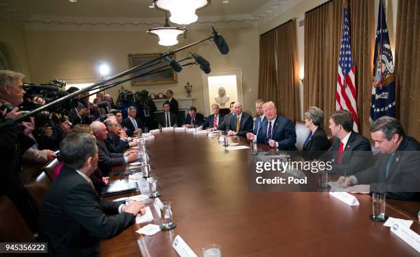 President Donald Trump participates in a meeting on trade with governors and members of Congress at the White House on April 12, 2018 in Washington,...