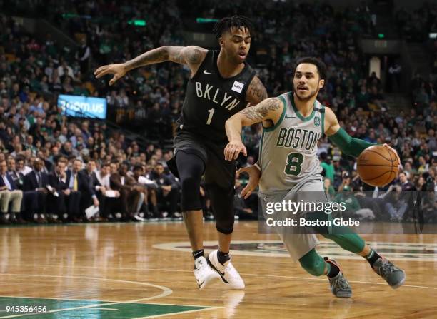 Boston Celtics' Shane Larkin drives to the basket against Brooklyn Nets' D'Angelo Russell during the third quarter. The Boston Celtics host the...