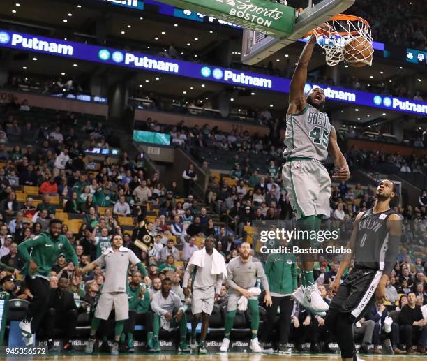 Boston Celtics' Kadeem Allen slam dunks on the Brooklyn Nets during the fourth quarter. The Boston Celtics host the Brooklyn Nets in a regular season...