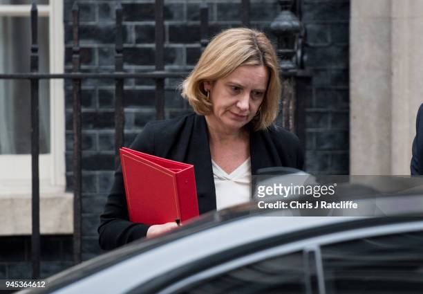Britain's Home Secretary Amber Rudd leaves after an emergency cabinet meeting at Downing Street on April 12, 2018 in London, England. British Prime...