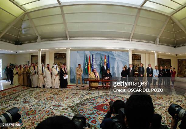 Saudi Arabia's crown prince Mohammed bin Salman and Spanish Minister of Defence Maria Doroles de Cospedal sign agreement at La Moncloa palace in...