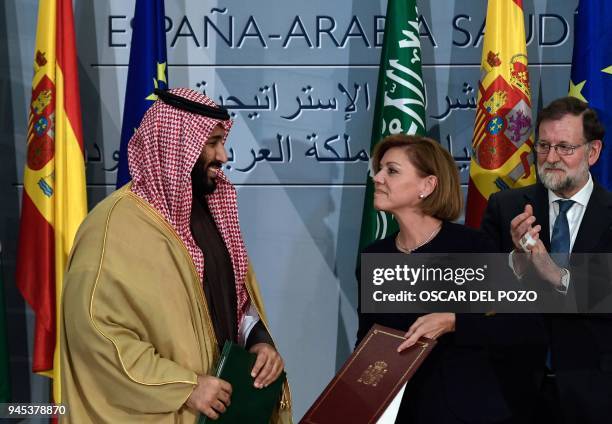 Saudi Arabia's crown prince Mohammed bin Salman and Spanish Minister of Defence Maria Doroles de Cospedal sign agreements as Spanish Pime Minister...