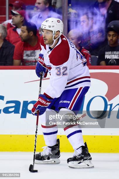 Mark Streit of the Montreal Canadiens skates with the puck in the first period against the Washington Capitals at Capital One Arena on October 7,...