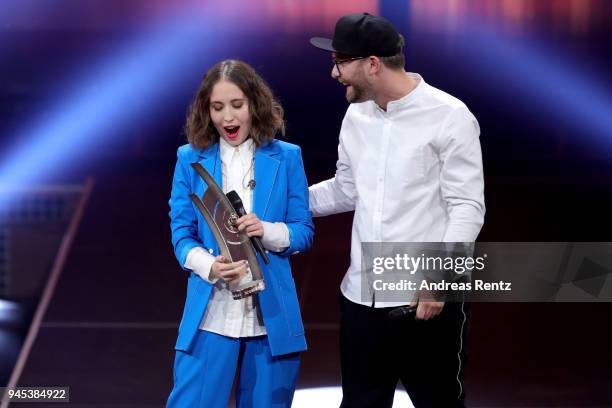 Best Female Artist - Pop National' Award winner Alice Merton and Marc Forster are seen on stage during the Echo Award show at Messe Berlin on April...