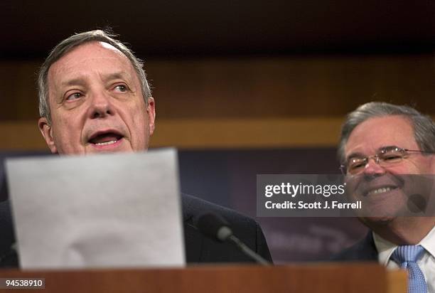 Senate Assistant Majority Leader Richard J. Durbin, D-Ill., reading from a "smoking Twitter" post by Sen. Jim DeMint, R-S.C., hailing the GOP slowing...