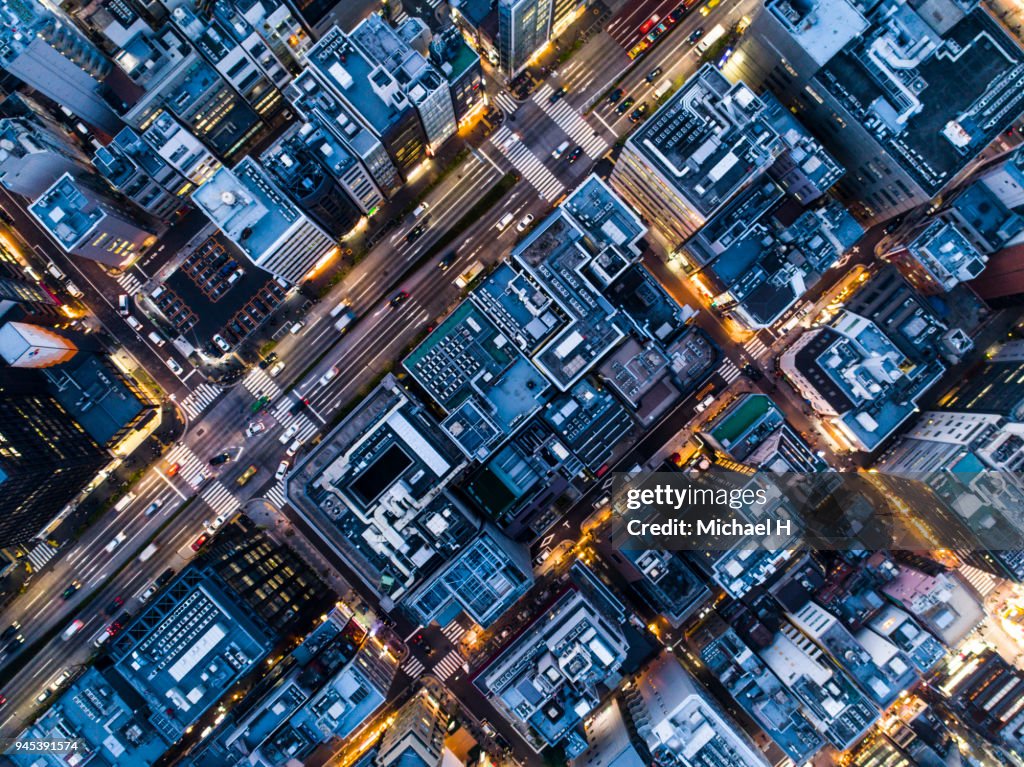 Aerial shots of buildings and rooftops.