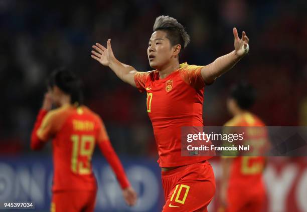Li Ying of China celebrates scoring the fifth goal during the AFC Women's Asian Cup Group A match between Jordan and China at the Amman International...