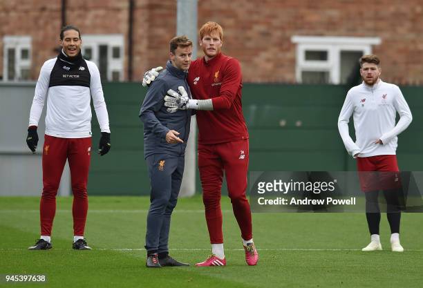 Conall Murtagh First-team fitness coach of Liverpool and Adam Bogdan during a training session at Melwood Training Ground on April 12, 2018 in...