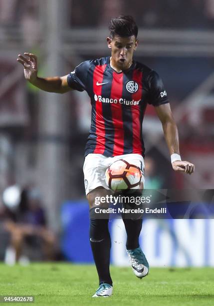 Alexis Castro of San Lorenzo drives the ball during a match between San Lorenzo and Atletico Mineiro as part of Copa CONMEBOL Sudamericana 2018 at...