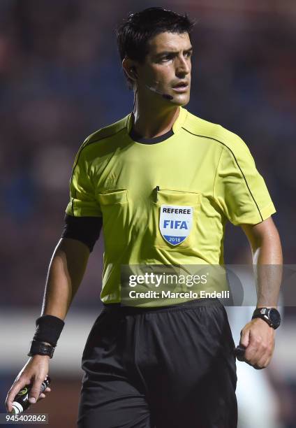 Referee Leodan Gonzalez of Uruguay looks on during a match between San Lorenzo and Atletico Mineiro as part of Copa CONMEBOL Sudamericana 2018 at...
