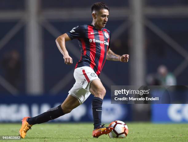 Gabriel Rojas of San Lorenzo drives the ball during a match between San Lorenzo and Atletico Mineiro as part of Copa CONMEBOL Sudamericana 2018 at...