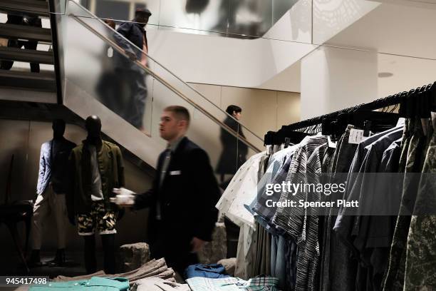People shop at the newly opened Nordstrom men's store, the company's first-ever Manhattan location in midtown at 57th and Broadway on April 12, 2018...