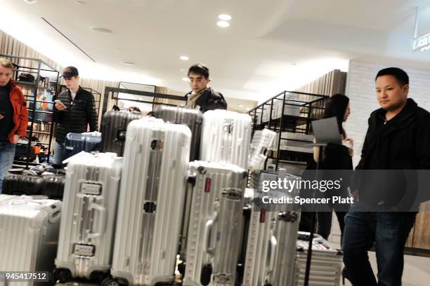 People shop at the newly opened Nordstrom men's store, the company's first-ever Manhattan location in midtown at 57th and Broadway on April 12, 2018...